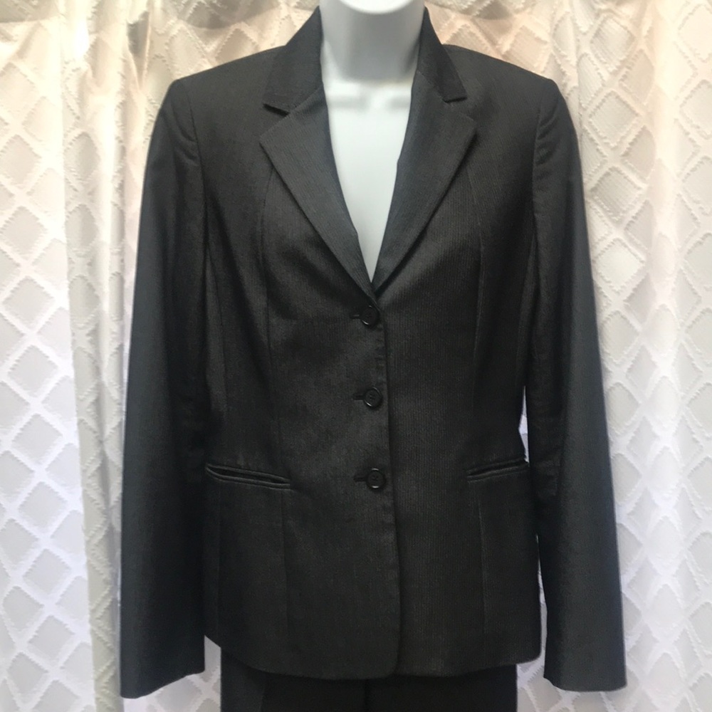Gray and white pinstriped suit